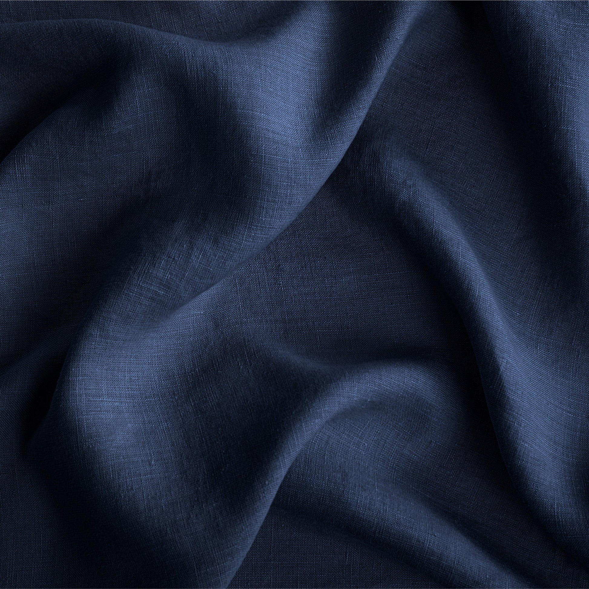 Close up of the Tuft and needle midnight color sheet set
