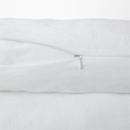 Close-up view of the zipper on the Tuft and Needle Hemp Duvet Cover ||color:honeycomb